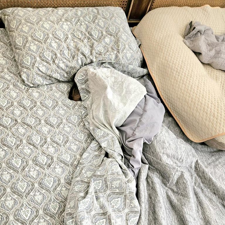 Should You Let Your Dog Sleep in Your Bed